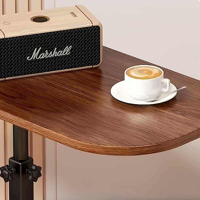 Compact desk side table positioned neatly beside a modern sofa