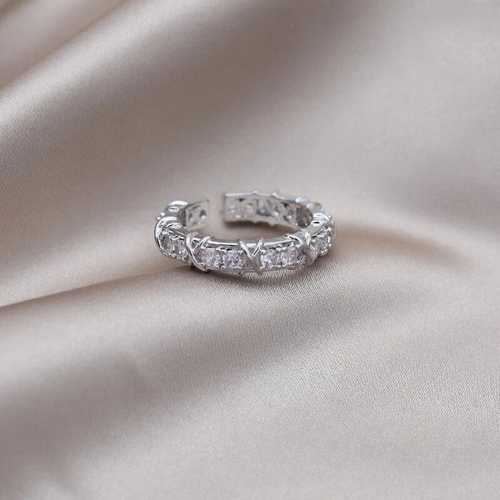 Side profile of unisex magnetic ring showcasing its open adjustable band