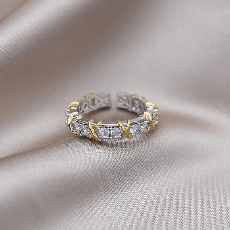 Front angle of the dual-tone wellness ring displaying the open band design