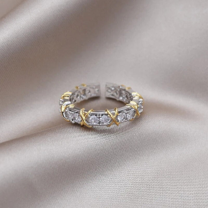Front angle of the dual-tone wellness ring displaying the open band design