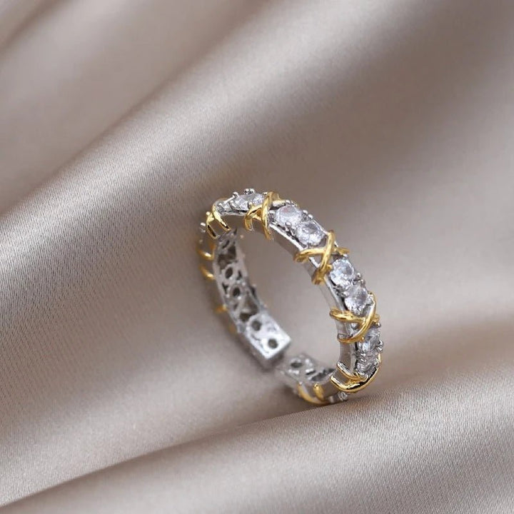 Detailed view of the silver and gold two-tone wellness ring