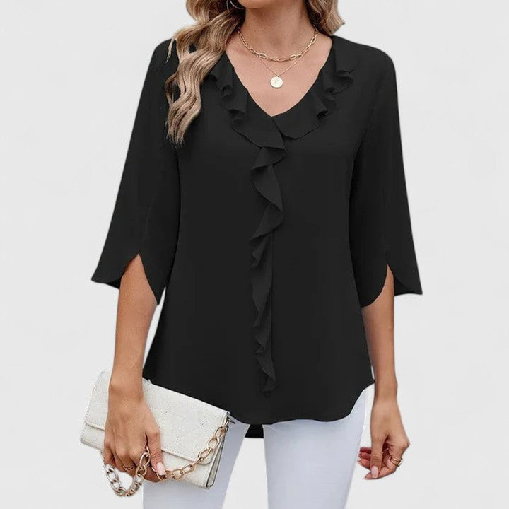Women's V-neck blouse featuring elegant ruffle front details and 3/4 sleeves.