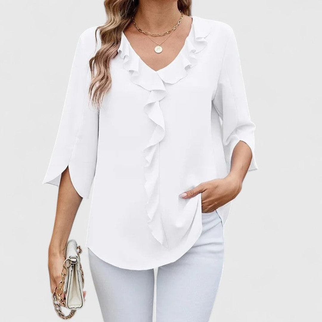 Casual wear ruffle top for women with stylish V-neckline and three-quarter sleeves.