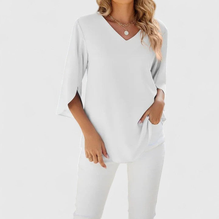 Fashionable women's ruffle front blouse, perfect for casual wear or office outfits.