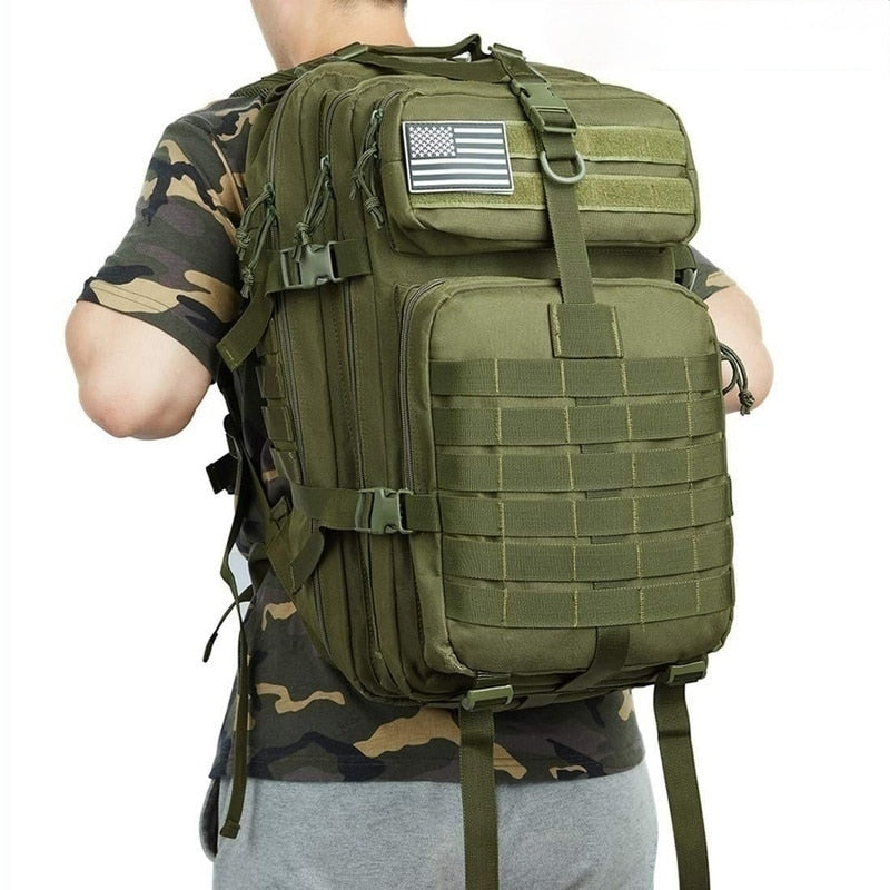 Interior compartment of 50L outdoor gear bag showing spacious storage and laptop sleeve