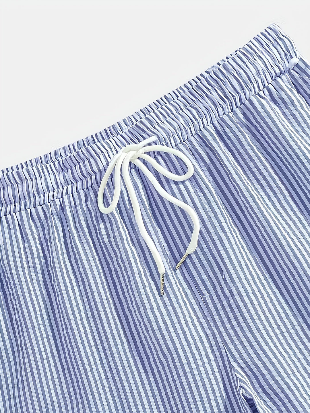 Detailed shot of elastic waistband and drawstring on mens shorts