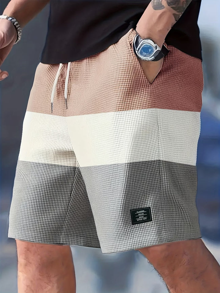 Man wearing grey textured casual summer shorts with comfortable fit