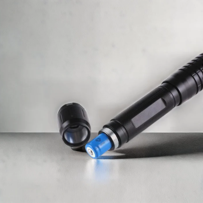 Tactical light fire starter feature igniting kindling in the wilderness