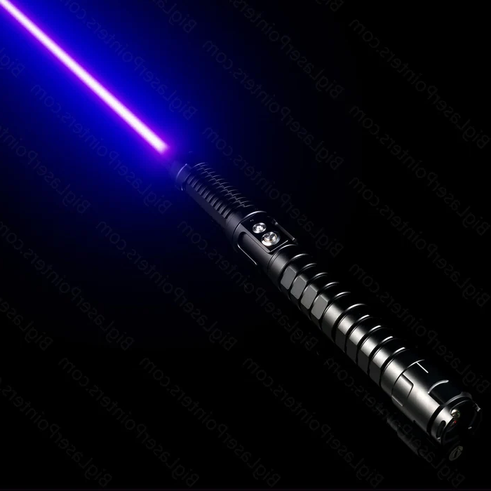 Compact survival gear laser torch held comfortably in a hiking hand