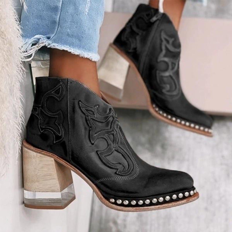 Top-down view of womens trendy cowboy booties highlighting toe shape and collar design