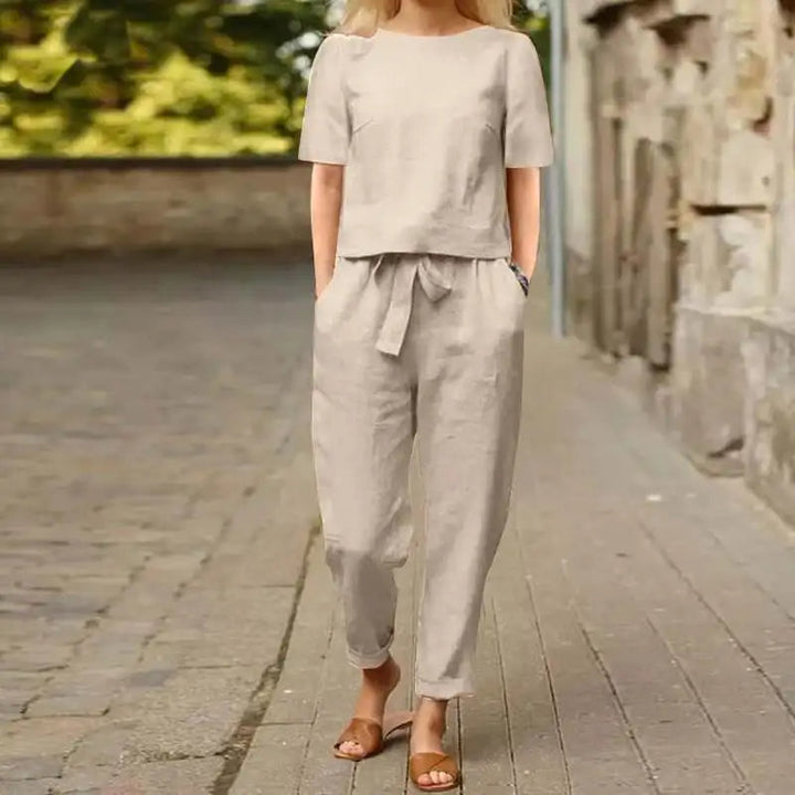 Woman wearing khaki cropped tie waist two-piece set outdoors