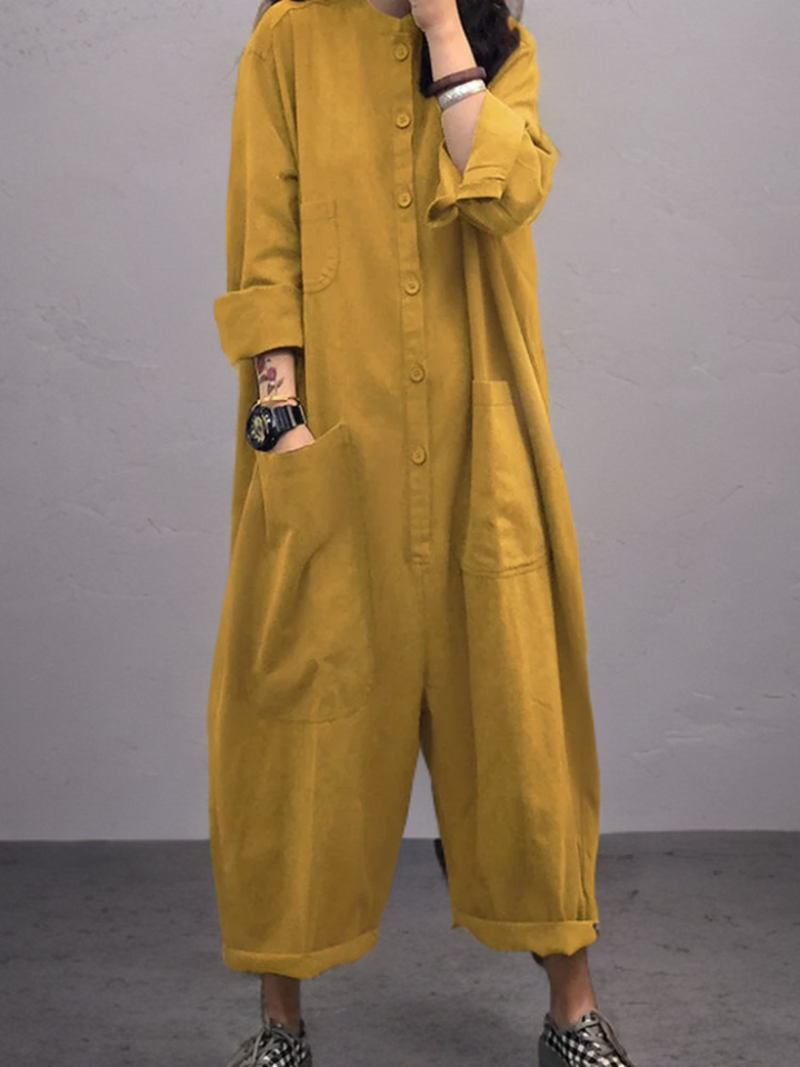 Full view of the yellow summer jumpsuit showcasing its relaxed silhouette