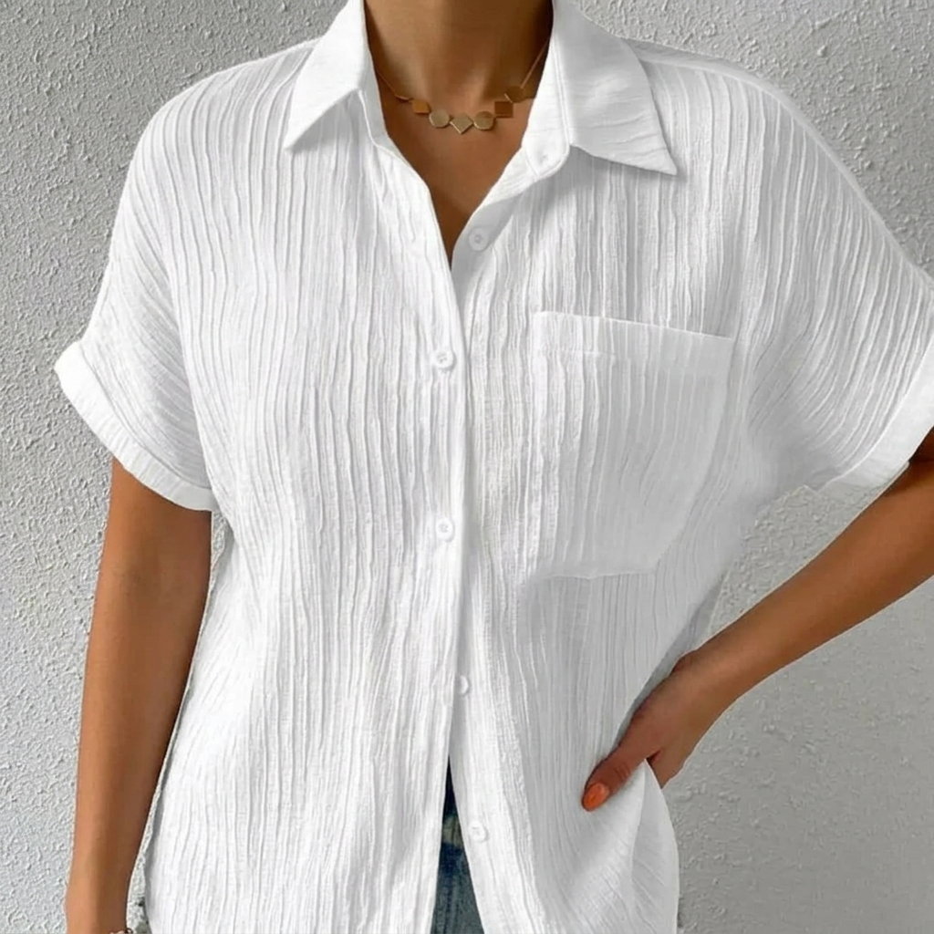 Short sleeve button-down blouse featuring lightweight crinkle fabric texture