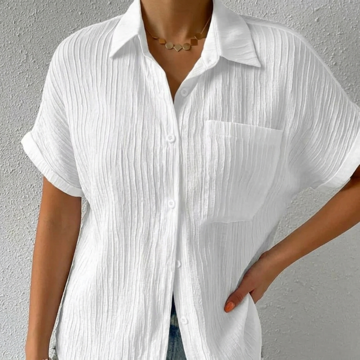 Short sleeve button-down blouse featuring lightweight crinkle fabric texture