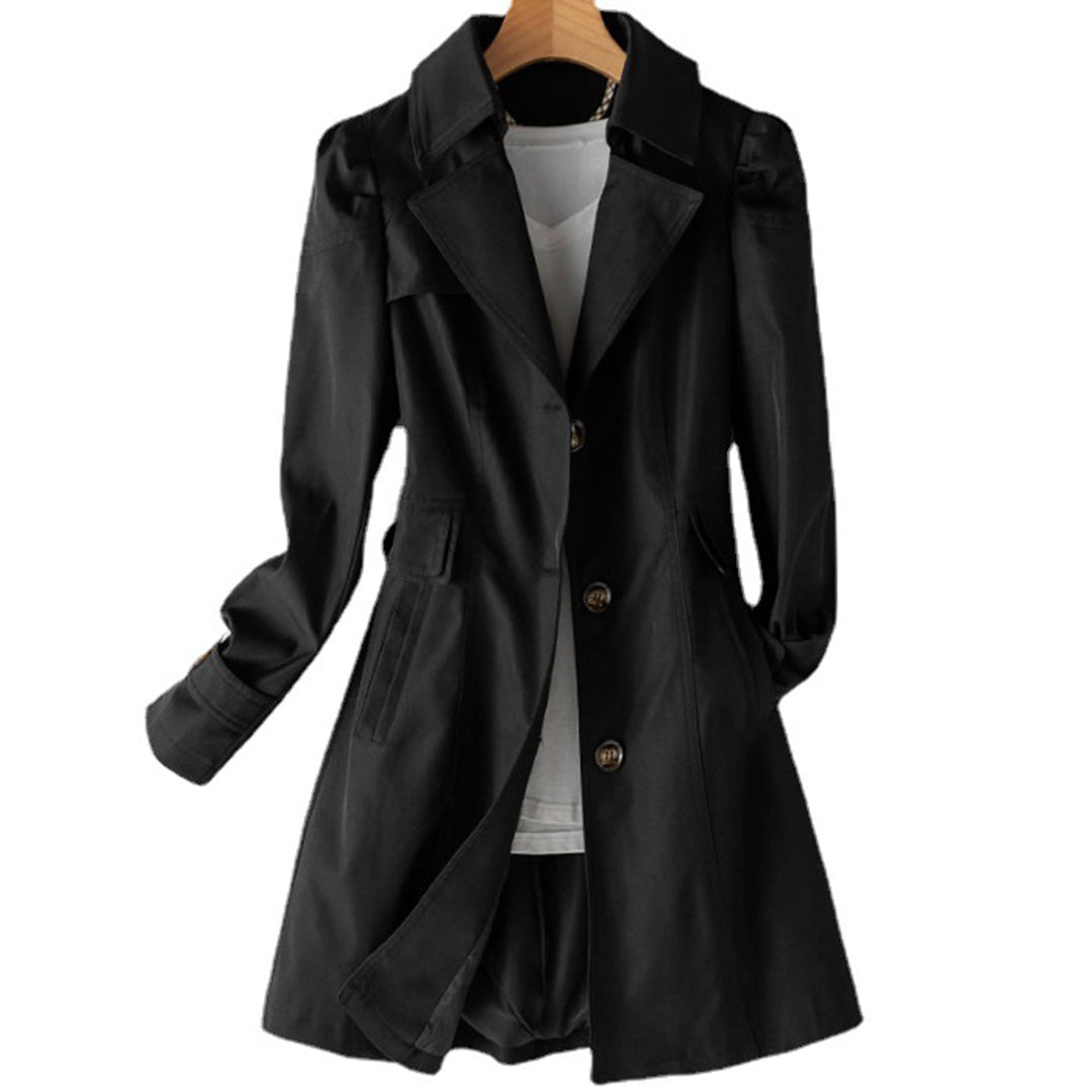Women's black double-breasted long trench coat displayed on hanger