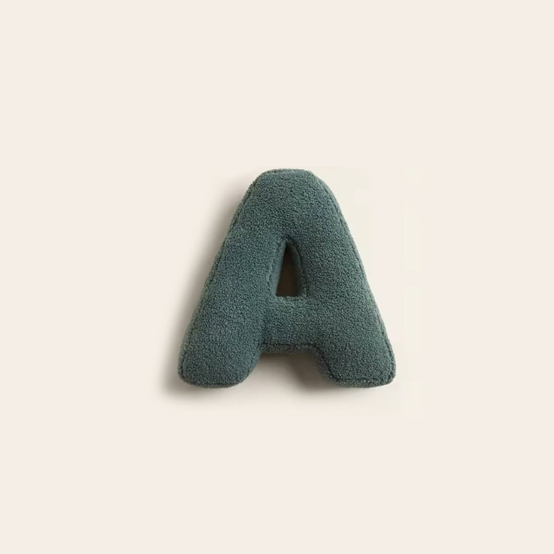 Single plush letter A decorative cushion in dark green color