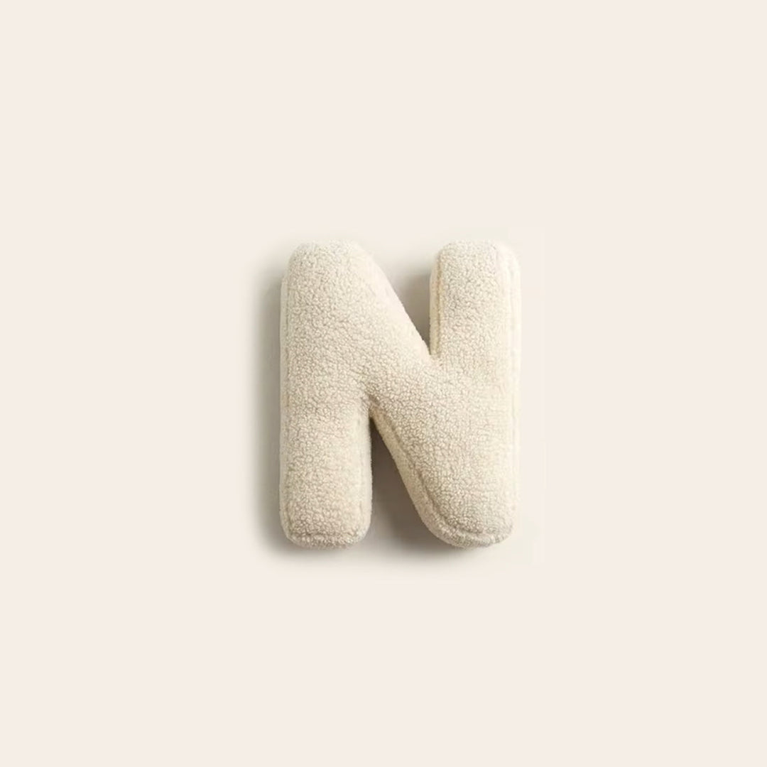 Stitch detail on decorative alphabet cushion letter pillow