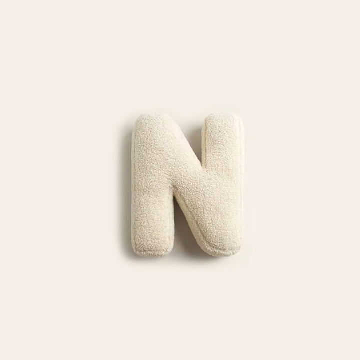 Stitch detail on decorative alphabet cushion letter pillow