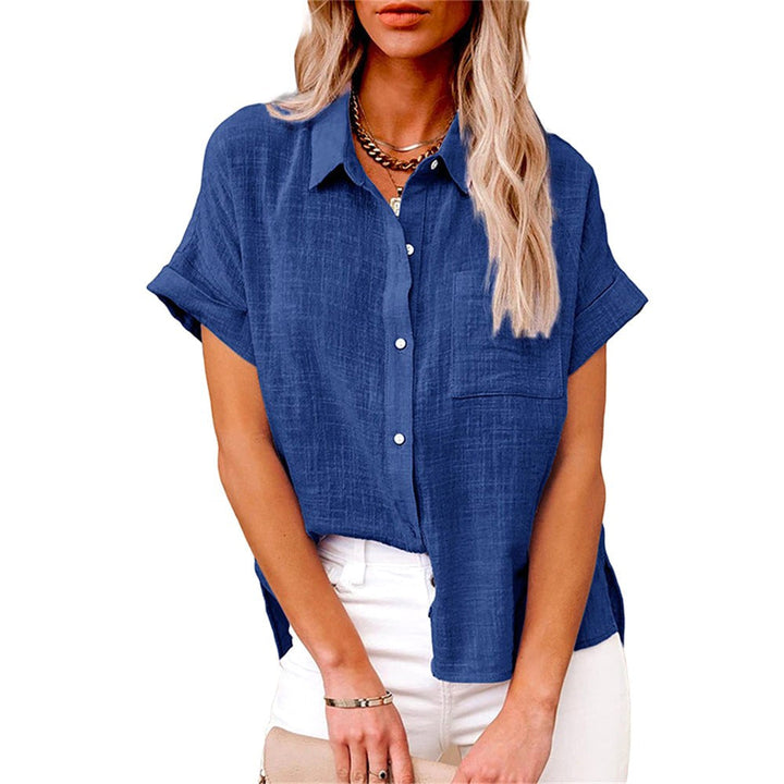 Woman wearing a royal blue button-front short sleeve blouse