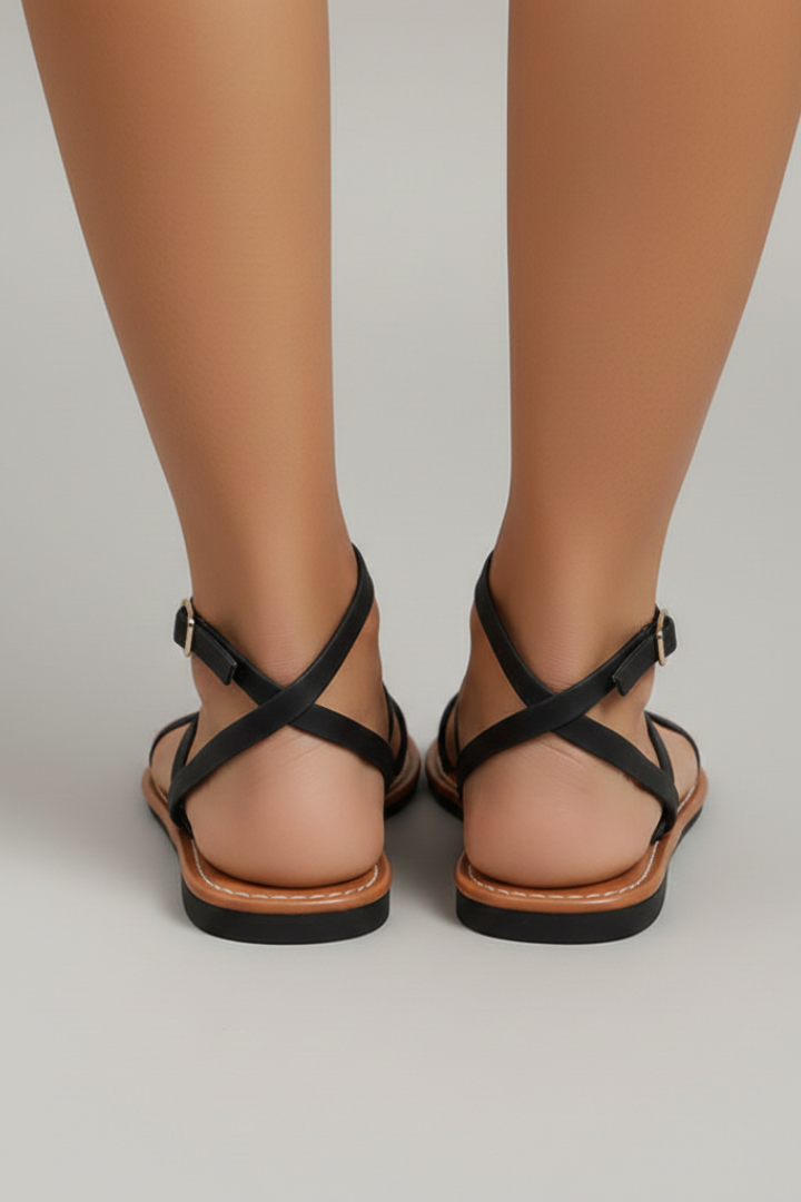 Womens black casual flat sandals with minimalist strappy design for summer