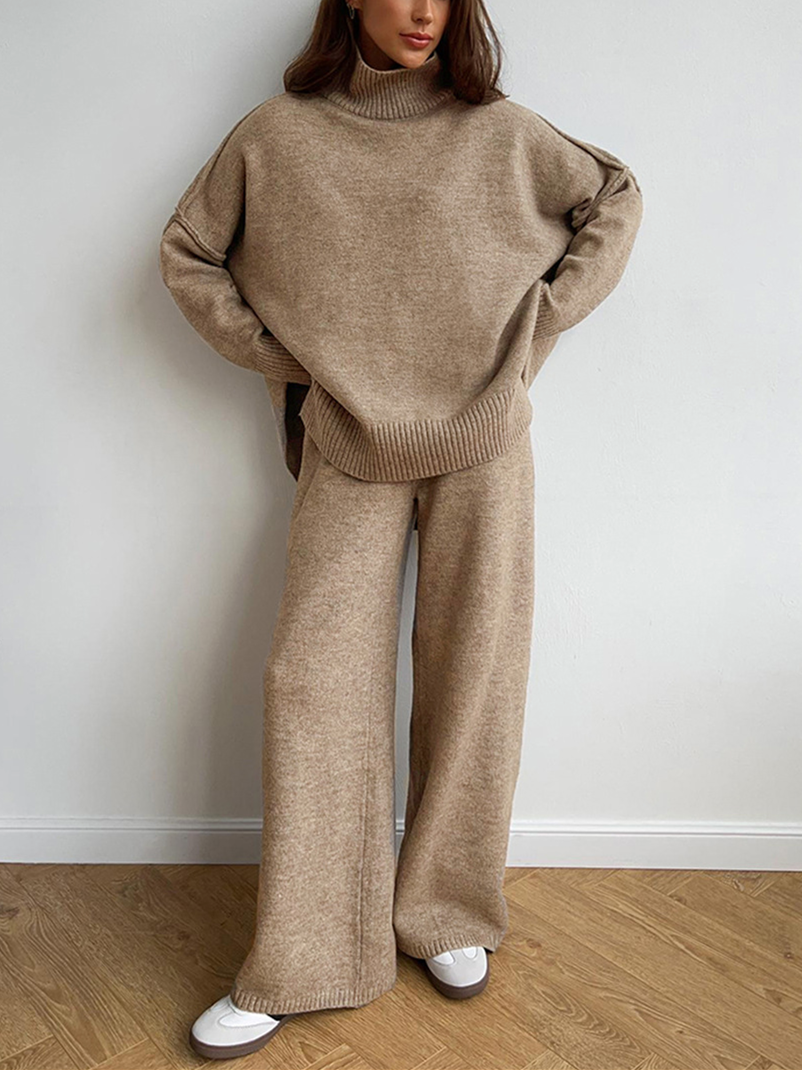 Woman wearing an oversized beige turtleneck two-piece set with wide-leg pants
