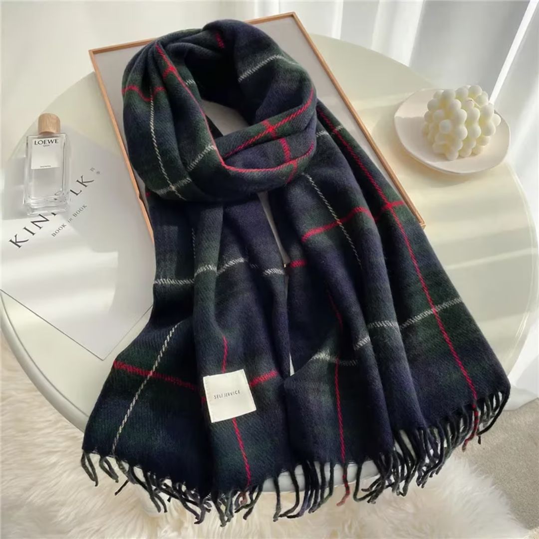 Navy blue plaid knitted winter scarf with decorative label and tassels