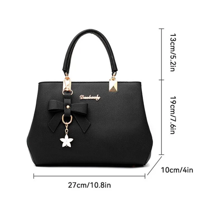 Back exterior view of women's minimalist casual crossbody purse