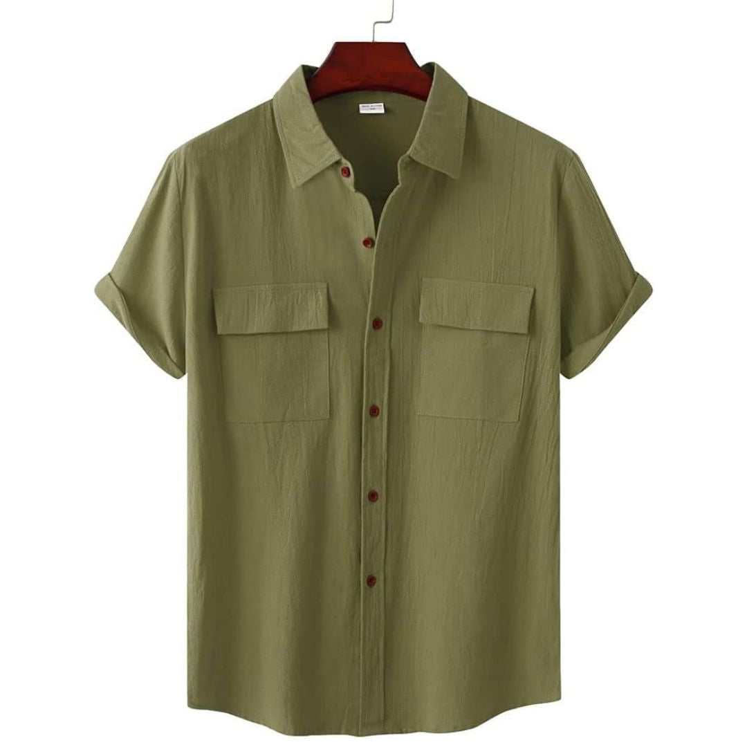 Close up of the fabric and button details on a womens casual short sleeve blouse.