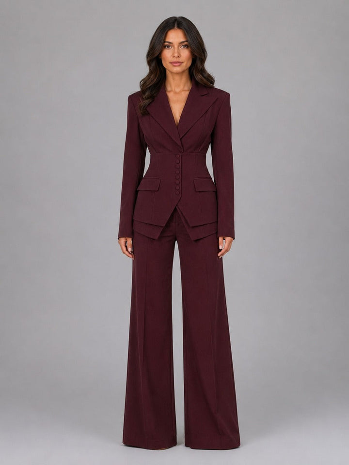 Side view of tailored nipped-waist blazer and palazzo trousers set for women