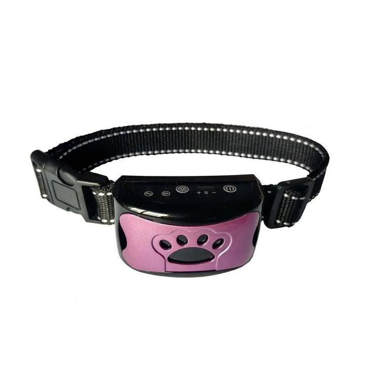 Anti-bark collar for dogs resting on a surface, highlighting pet training supplies