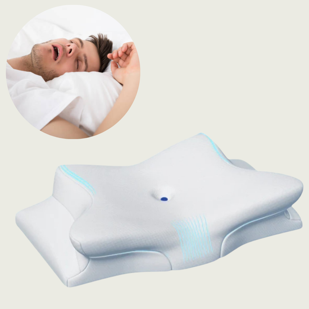 Ergonomic white anti-snore memory foam pillow shown on a bed