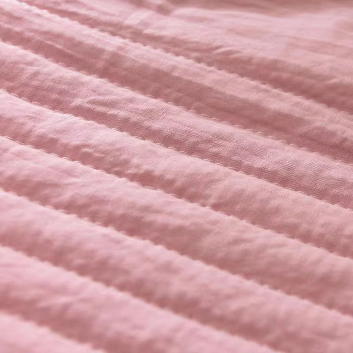 Soft breathable bedding blanket styled on a minimalist bed for ultimate relaxation and comfort