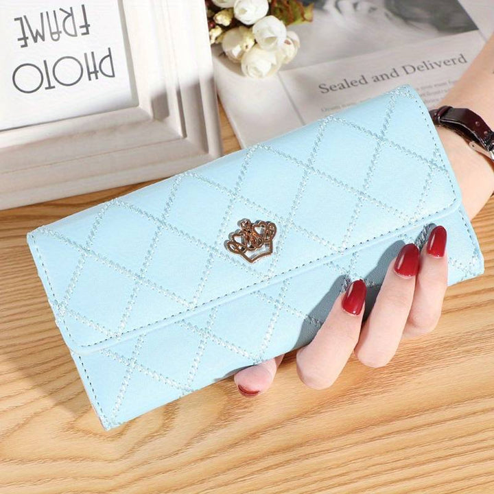 Women's trifold wallet featuring a classic argyle pattern and a shiny gold crown accent.