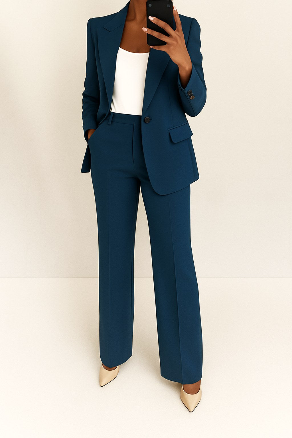 Side profile of women's professional tailored suit in business casual style