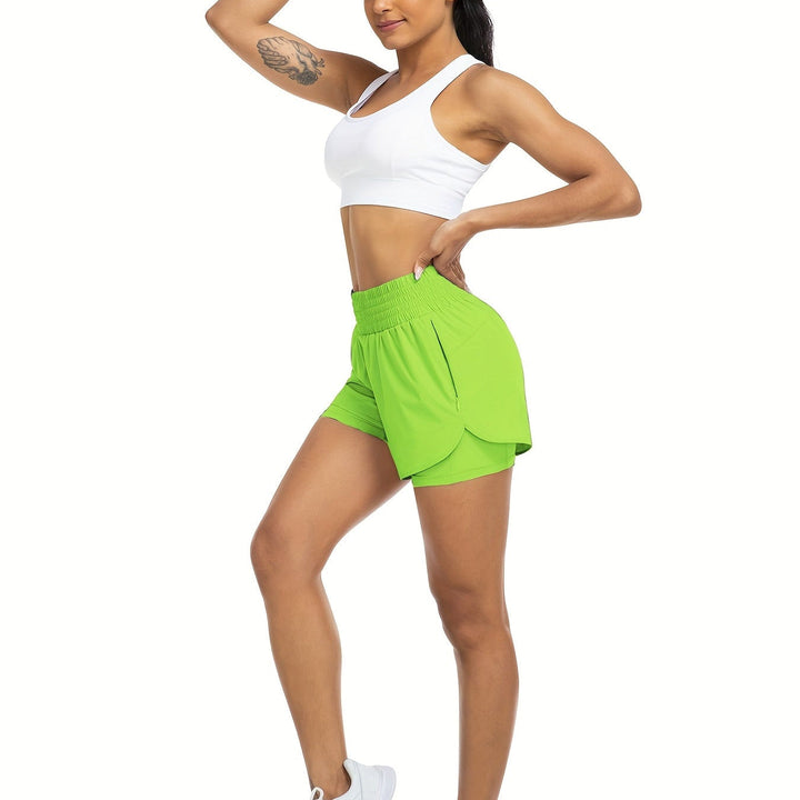 Women's high-waisted double-layer athletic shorts for running and fitness workouts