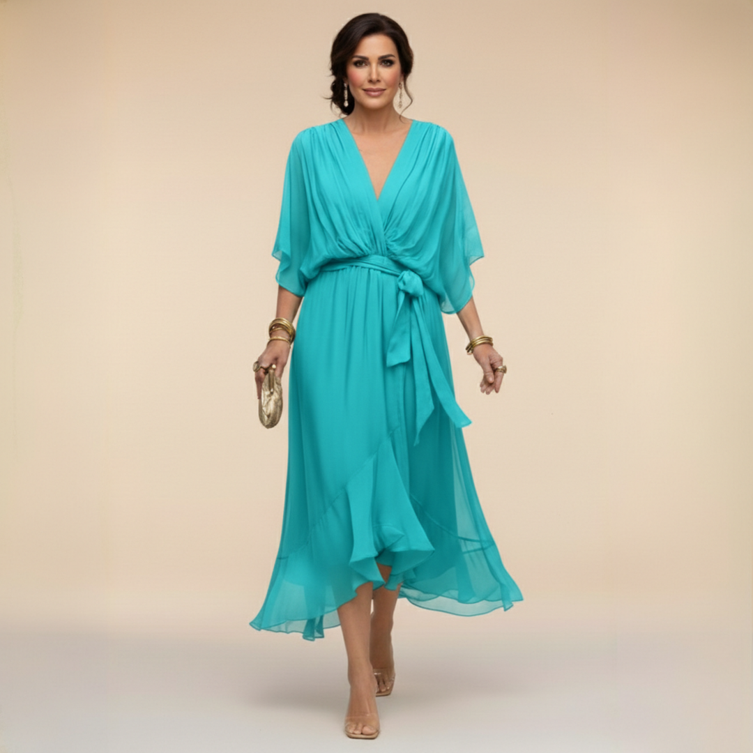 Close-up of elegant V-neckline and fabric on women's belted midi party dress