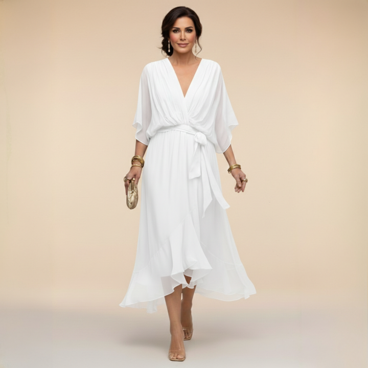 Back view of women's V-neck midi dress featuring tailored waist and sleek silhouette