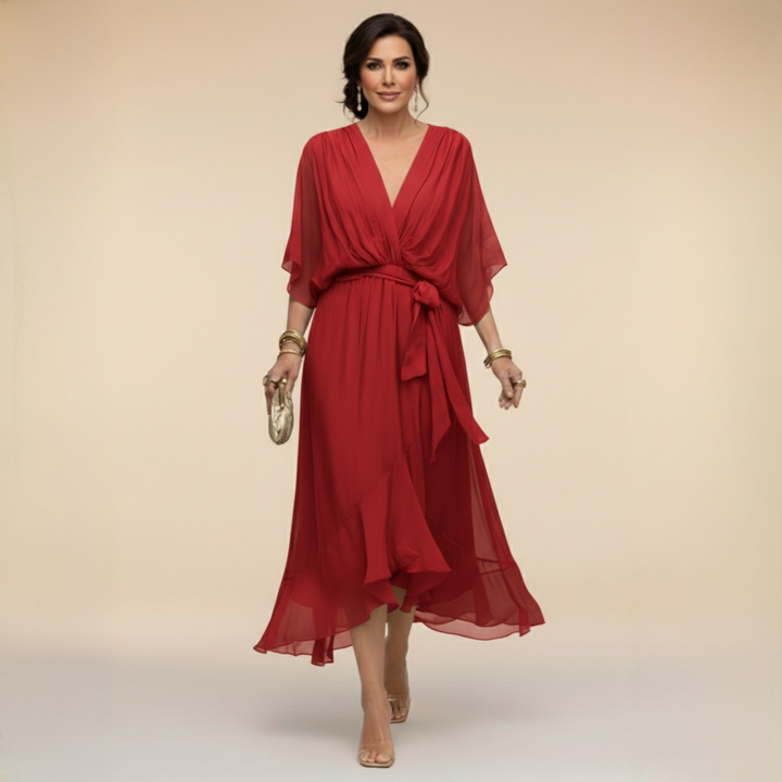 Full length of women's sleeveless V-neck midi dress styled for formal events