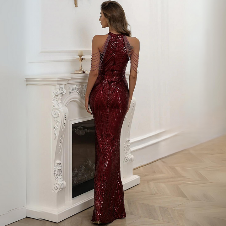 Elegant halter neckline detail on the women's formal evening ball gown.