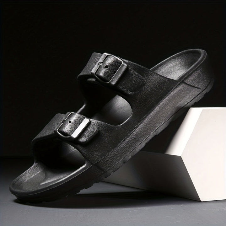 Black men's double buckle slide sandal on display block
