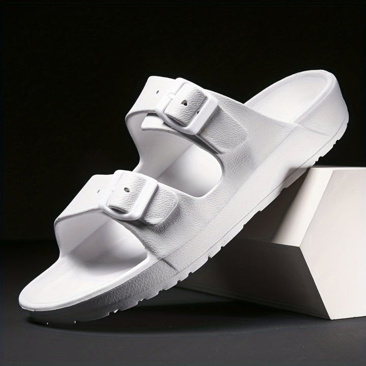 White men's double buckle slide sandal on display block