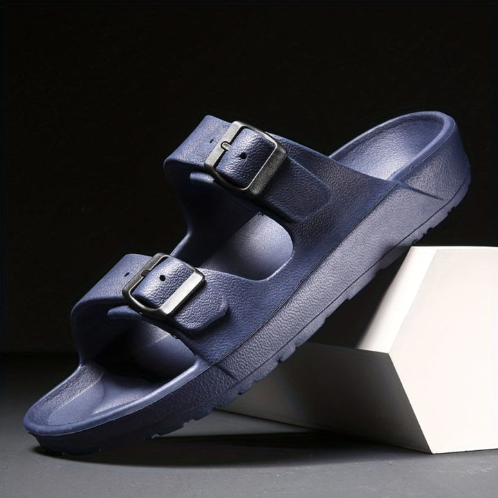 Navy blue men's double buckle slide sandal on display block