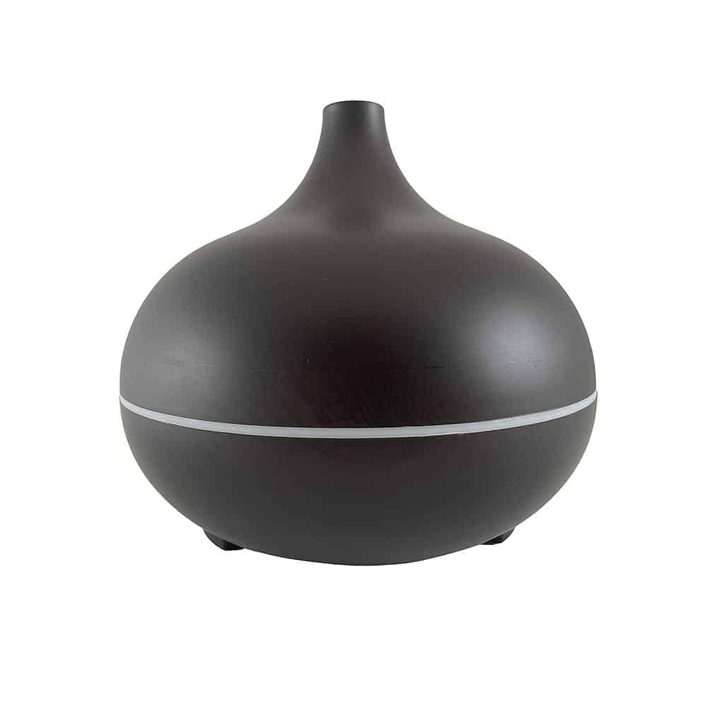 Relaxing home fragrance setup with ultrasonic diffuser and remote