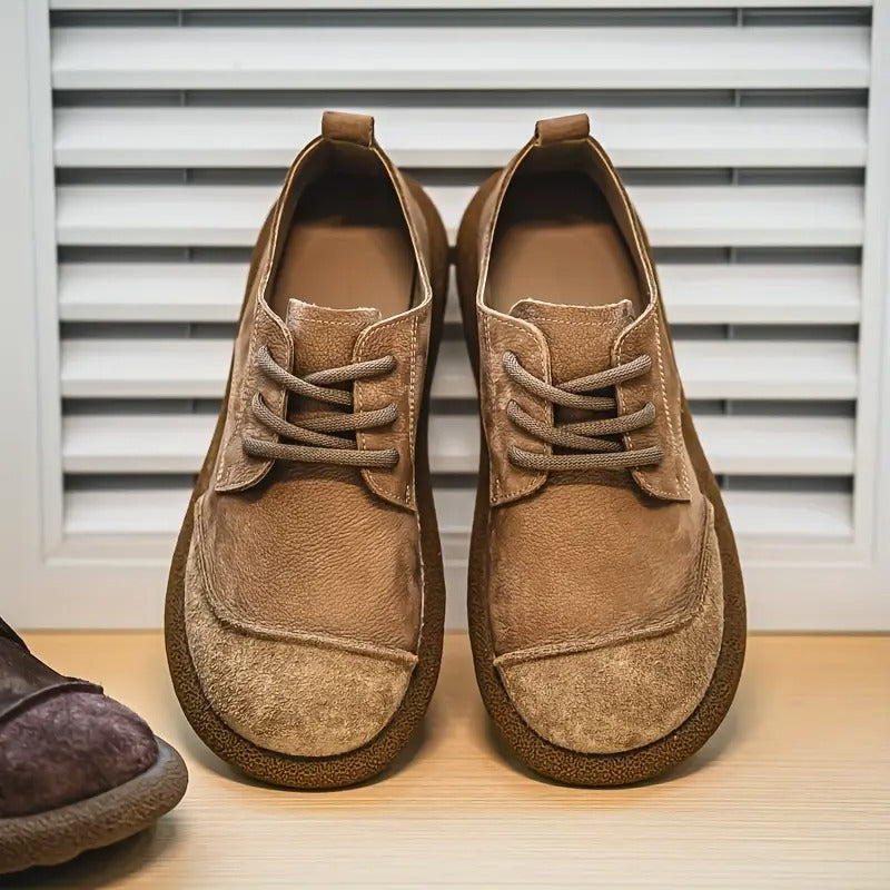 Front view of men's classic khaki lace-up orthopedic shoes with textured toe caps