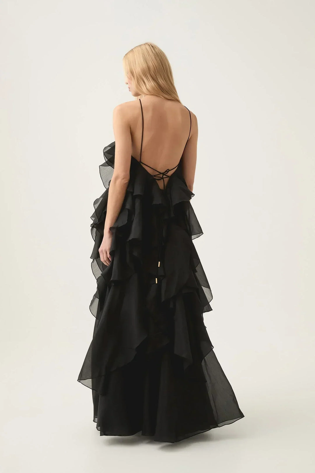 Formal gown silhouette showcasing flowing maxi dress design