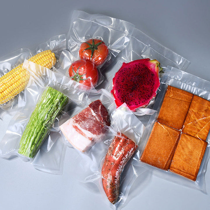 Compact automatic food sealer device on a clean kitchen counter