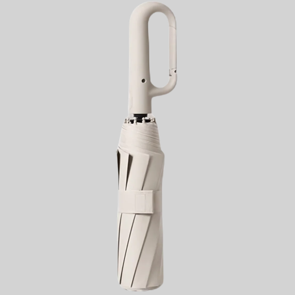 Compact foldable travel umbrella open, showing sturdy canopy structure
