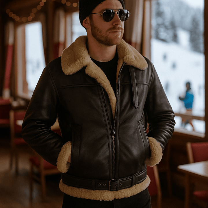 Man wearing brown men's aviator jacket in winter setting