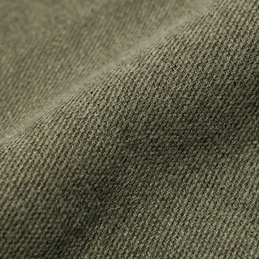 Detail of durable stitching and soft washed fabric on canvas bag