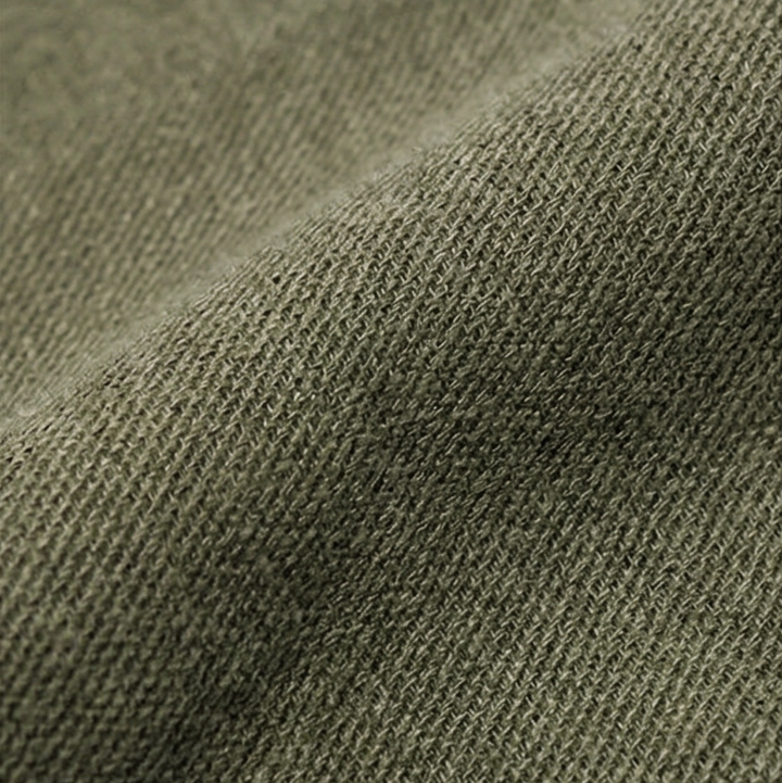 Detail of durable stitching and soft washed fabric on canvas bag